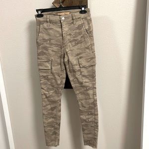 Joe’s distressed hem camouflage pants. Multiple pockets. Zip button front